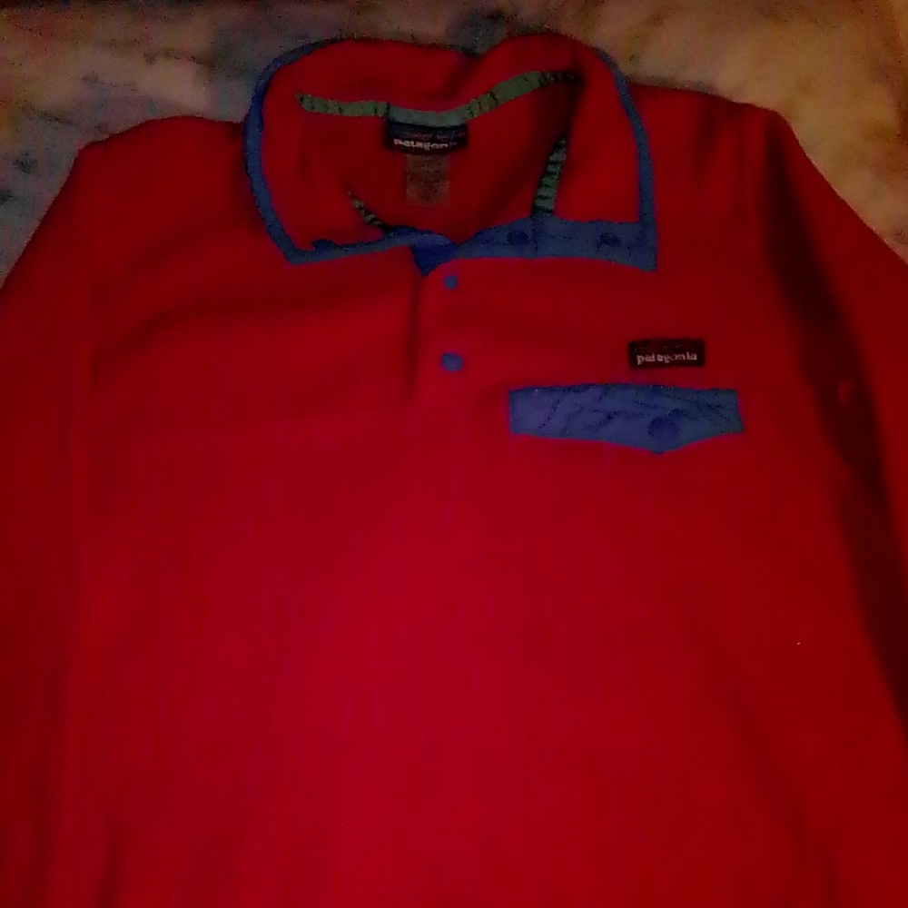 Pink , green and teal Patagonia size small 100%polyester.